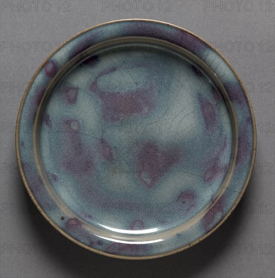 Plate:  Jun Ware, 1100s-1200s. Northern China, Northern Song dynasty (960-1127) - Jin dynasty (1115-1234). Stoneware with mottled glaze; diameter: 18.1 cm (7 1/8 in.); overall: 2.5 cm (1 in.).