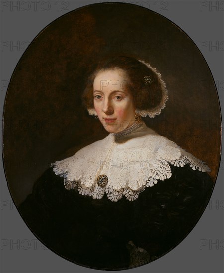 Portrait of a Woman, 1635 or earlier. Rembrandt van Rijn (Dutch, 1606-1669), and Studio. Oil on wood; framed: 97.8 x 83.8 x 6.4 cm (38 1/2 x 33 x 2 1/2 in.); unframed: 77.5 x 64.8 cm (30 1/2 x 25 1/2 in.).