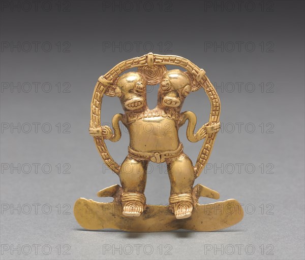 Double-Headed Figure Pendant, c. 700-1550. Western Panama, or Diquís, Costa Rica,  Veraguas-Gran Chiriquí or Diquís Style, 8th-16th Century. Cast and hammered gold; overall: 7.1 x 6.7 x 1.2 cm (2 13/16 x 2 5/8 x 1/2 in.).