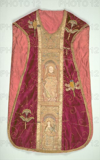 Chasuble, 1500-1520. England, London (embroidery) and Italy, Florence (velvet), early 16th century. Silk, gold thread, sequins; appliqué, embroidery: couching stitches  Velvet: solid pile, silk; embroidery: or nué; overall: 122.5 x 74 cm (48 1/4 x 29 1/8 in.)