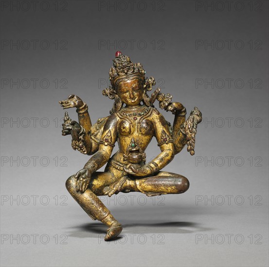 Vasudhara, Goddess of Abundance, 1300s-1400s. Nepal, 14th-15th century. Gilt bronze and semi-precious stones; overall: 16.2 cm (6 3/8 in.).