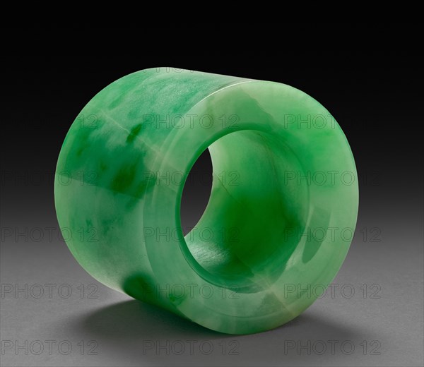 Thumb Ring, 1800s-1900s. China, 19th-20th century. Green and white jade; diameter: 3.4 cm (1 5/16 in.); overall: 3 cm (1 3/16 in.).