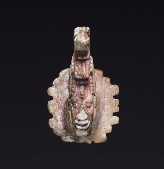Pair of Ear Ornaments, c. 600-900. Mexico or Central America, Maya, 7th-10th century. Carved shell; overall: 3.8 x 2.3 cm (1 1/2 x 7/8 in.).