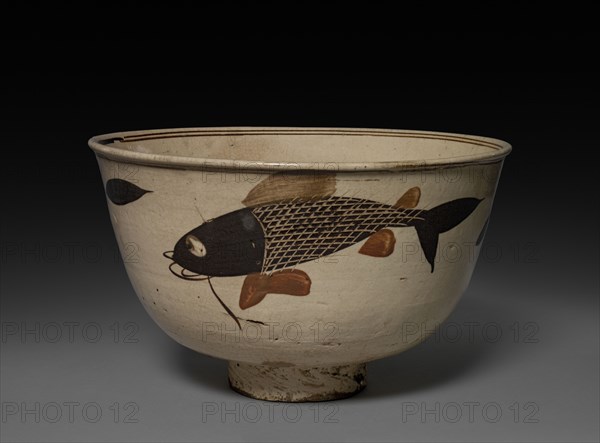 Bowl: Cizhou ware, 1368- 1644. China, Ming dynasty (1368-1644). Stoneware; diameter: 27.4 cm (10 13/16 in.); overall: 16.4 cm (6 7/16 in.).