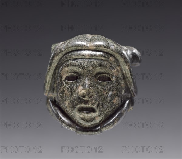 Head in Mouth of Snake, 1325-1519. Central Mexico, Aztec, Post-Classic Period. Greenstone; overall: 5.4 x 5.3 x 4.8 cm (2 1/8 x 2 1/16 x 1 7/8 in.).