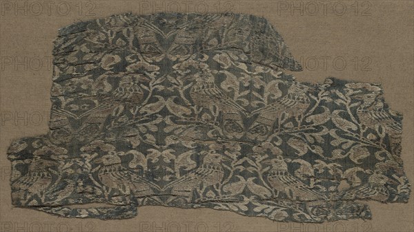 Fragment, late 1100s or early 1200s. Iran, Rayy, late 12th or early 13th century. Lampas weave, silk; overall: 15.2 x 33.6 cm (6 x 13 1/4 in.)