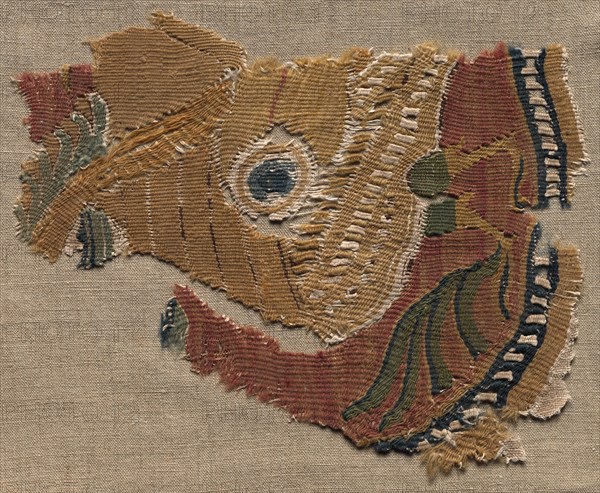Fragmentary Roundel, Ornament from a Large Cloth, 800s - 900s. Egypt, Al-Bahnasá, Late Tulunid or Second Abbasid period, 9th - 10th century. Tabby weave with inwoven tapestry ornament, linen and wool; overall: 21.6 x 17.8 cm (8 1/2 x 7 in.)