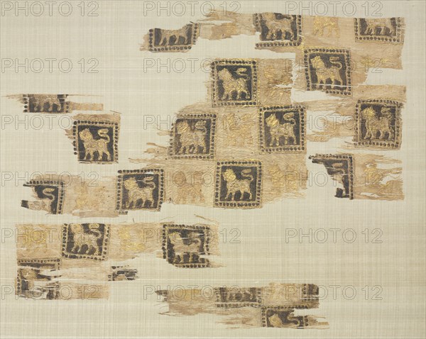 Fragment with gold leaf lions, 1000s - 1100s. Iran or Iraq, Seljuk period. Plain weave: silk warp and cotton weft (mulham); block printed and gold leaf; overall: 32.1 x 40 cm (12 5/8 x 15 3/4 in.)