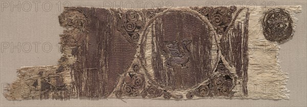 Fragment of an Embroidery, 1100s. Iran or Iraq, Seljuk period, 12th century A.D.. Embroidery in silk and gold filé on mulham tabby ground; overall: 7 x 23.5 cm (2 3/4 x 9 1/4 in.).