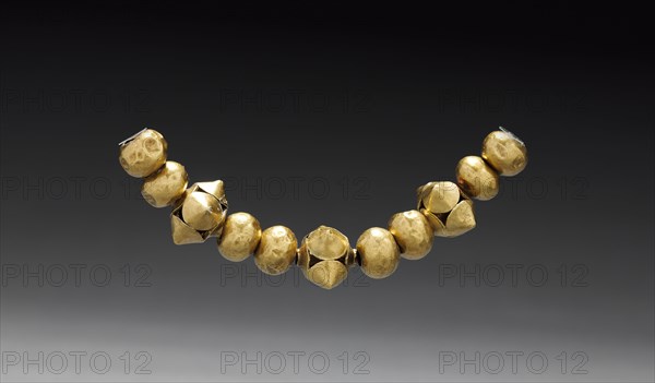 Beads, c. 900-1550. Central Colombia, Muisca Style?, 10th-16th century. Hammered gold; overall: 34.3 cm (13 1/2 in.).