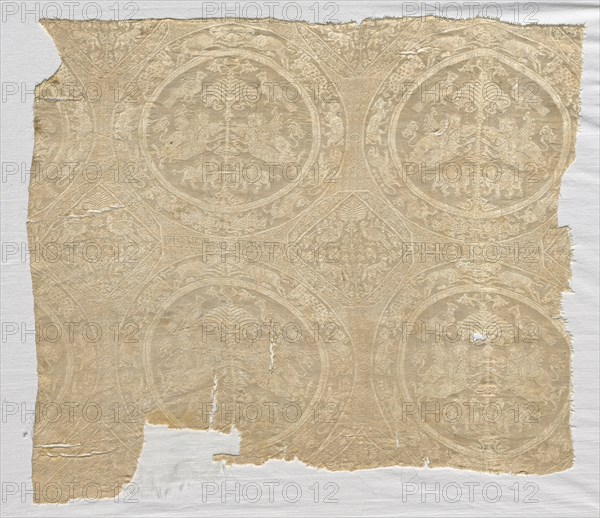 Silk fragment with confronted animal medallions and kufic bands, 1480-1649. Iran. Diasper, tabby weave; silk; overall: 39.6 x 45.4 cm (15 9/16 x 17 7/8 in.)