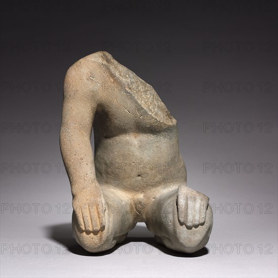 Kneeling Figure, c. 1200-600 BC. Mexico, Guerrero, Olmec, 1200-300 BC. Stone; overall: 26.3 x 20 x 21.3 cm (10 3/8 x 7 7/8 x 8 3/8 in.).
