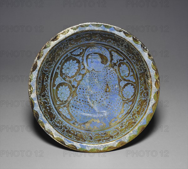 Luster Dish with Seated Prince, 1170-1220. Iran, Kashan, Seljuk period, late 12th century. Fritware with luster-painted design; overall: 7.5 x 39 cm (2 15/16 x 15 3/8 in.).