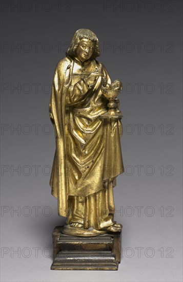 Saint John the Evangelist, 1450-1475. South Netherlands, probably Malines, 15th century. Gilt bronze or brass; without base: 29.9 x 11.8 cm (11 3/4 x 4 5/8 in.)