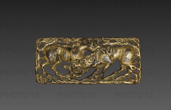 Belt Buckle with Animals, 202 BC- 9. China, Ordos region, Western Han dynasty (202 BC-AD 9). Gilt bronze; overall: 6.1 x 11.8 cm (2 3/8 x 4 5/8 in.).