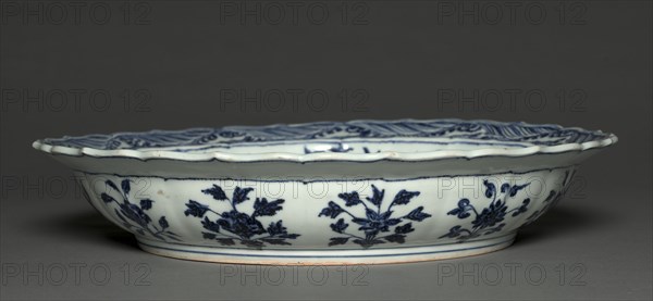 Plate with Grapes and Floral Sprays, 1426-35. China, Jiangxi province, Jingdezhen, Ming dynasty (1368-1644), Xuande reign (1426-35). Porcelain with underglaze blue decoration; diameter: 43.2 cm (17 in.); overall: 7.7 cm (3 1/16 in.).