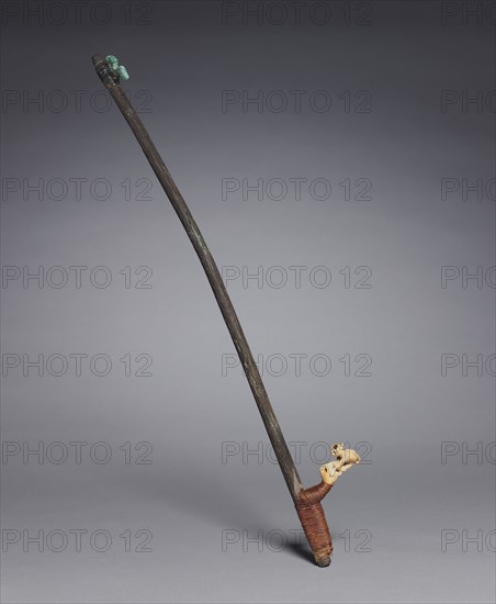 Spear-Thrower, 600-1000. Peru, South Coast?, Middle Horizon?, 6th-10th Century?; modern assembly of ancient parts?. Wood, metal, bone, thread, sinew; overall: 52.8 cm (20 13/16 in.).
