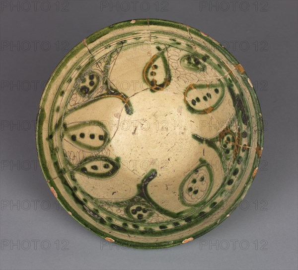 Bowl, 1000s-1100s. Iran, Amul, 11th-12th century. Earthenware with underglaze slip-painted decoration; overall: 7.8 x 18 cm (3 1/16 x 7 1/16 in.).