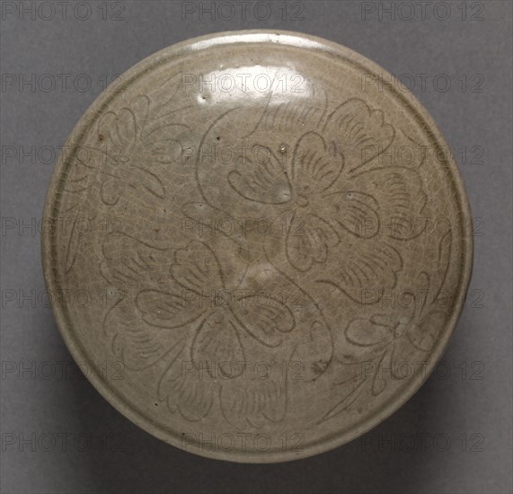 Box: Yue ware (lid), 960-1279. China, Zhejiang province, Song dynasty (960-1279). Glazed stoneware with incised decoration; diameter: 12.5 cm (4 15/16 in.); overall: 5.4 cm (2 1/8 in.).