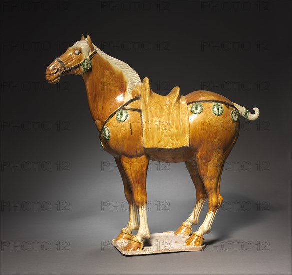 Horse, late 7th-8th Century. China, probably Henan province, Tang dynasty (618-907). Glazed earthenware, sancai (three-color) ware; overall: 76.8 cm (30 1/4 in.).