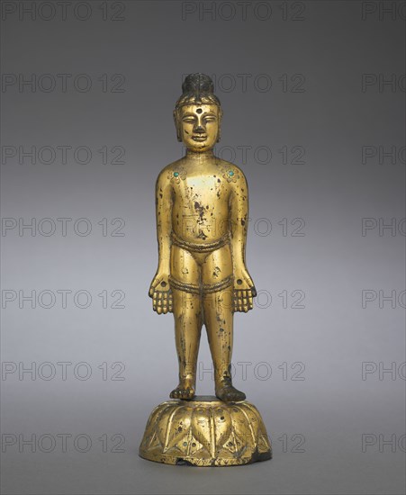 The New-born Buddha, 400s. China, Northern Wei dynasty (386-534). Gilt bronze with inlays of blue glass and turquoise; overall: 19.4 cm (7 5/8 in.); diameter of base: 6.8 cm (2 11/16 in.); base: 3.1 cm (1 1/4 in.)