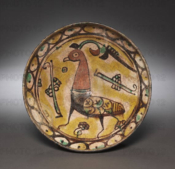 Bowl, 900s. Iran, Nishapur, Samanid Period, 10th Century. Earthenware with underglaze slip-painted decoration; overall: 11.5 x 28 cm (4 1/2 x 11 in.).