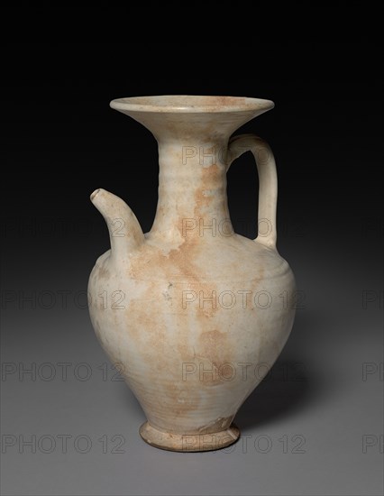 Ewer: Cizhou ware, 1105. China, Northern Song dynasty (960-1127). Buff stoneware with underglaze slip coating; diameter of mouth: 13.8 cm (5 7/16 in.); overall: 29.9 cm (11 3/4 in.).