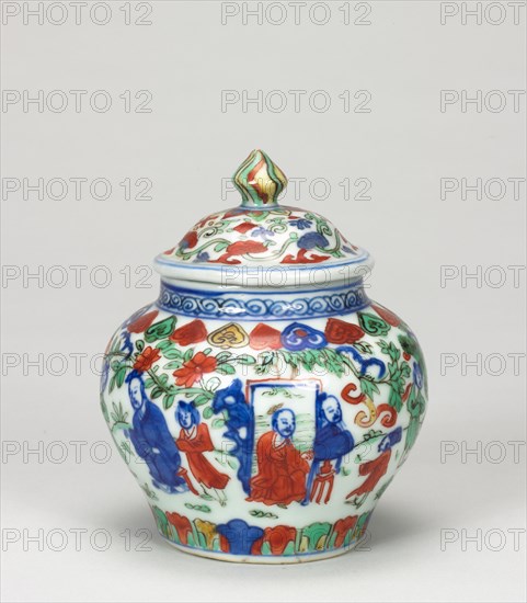 Covered Jar, 1573-1620. China, Jiangxi province, Jingdezhen kilns, Ming dynasty (1368-1644), Wanli reign (1572-1620). Porcelain with blue underglaze and overglaze in red, green and blue enamels; overall: 10.2 cm (4 in.).