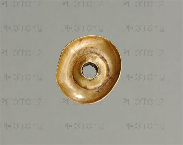 Ear Ornament(?), 500-200 BC. Peru, North Highlands, Chavín de Huantar(?), Chavín style. Hammered and cut gold; diameter: 2.8 cm (1 1/8 in.); overall: 1.6 cm (5/8 in.).