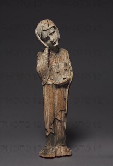 Mourning Saint John, c. 1240-1260. Austria, Region of Salzburg, Lungau?, 13th century. Painted wood; overall: 43.8 x 11.5 cm (17 1/4 x 4 1/2 in.).