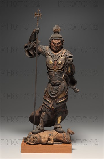 Guardian King of the North (Bishamonten), Kamakura Period (1185-1333). Japan, Kamakura Period (1185-1333). Wood with gold polychromy; overall: 76.8 x 28.6 cm (30 1/4 x 11 1/4 in.); base: 5.2 cm (2 1/16 in.).