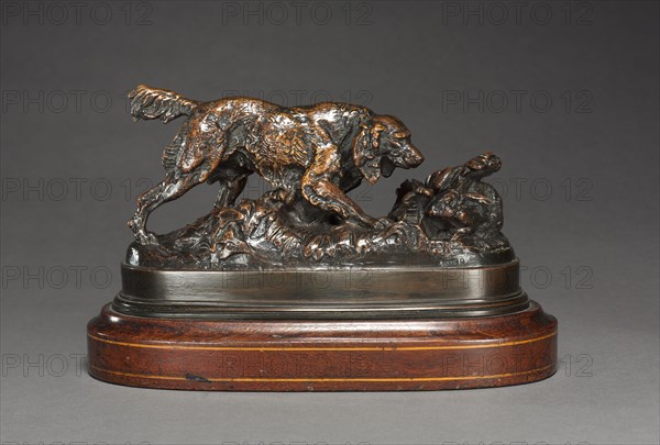 Spaniel Pointing a Rabbit, c. 1830 -1875. Antoine-Louis Barye (French, 1796-1875). Bronze; overall: 11.5 x 21.6 x 8 cm (4 1/2 x 8 1/2 x 3 1/8 in.)
