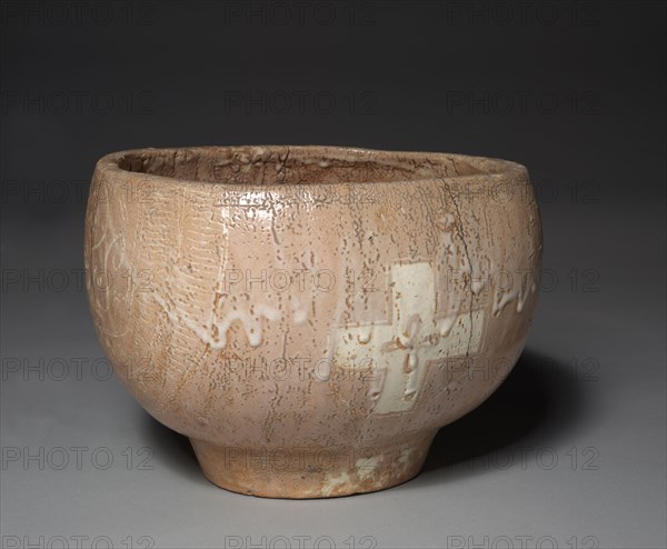 Baptismal Bowl with Christian Design of Cross and Insignia of the Society of Jesus: Hagi Ware, c. 1600. Japan, Yamaguchi Prefecture, Momoyama Period, 1573-1615. Glazed stoneware, Waridawara type ; diameter: 31.2 cm (12 5/16 in.); overall: 23.9 x 31.8 cm (9 7/16 x 12 1/2 in.).