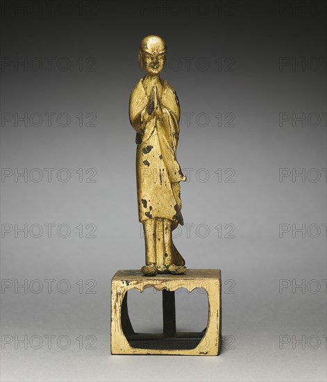 Adoring Monk, early 500s. China, Northern Wei dynasty (386-534). Gilt bronze; overall: 14.9 cm (5 7/8 in.); base: 3.6 x 5.2 x 3.9 cm (1 7/16 x 2 1/16 x 1 9/16 in.); figure: 11.5 cm (4 1/2 in.).