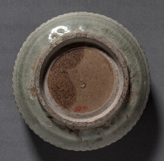 Covered Box with Carved Floral Design: Yaozhou Ware, 1100s. China, Shanxi province, Northern Song dynasty (960-1127). Glazed stoneware; diameter: 10.7 cm (4 3/16 in.); overall: 5.2 cm (2 1/16 in.).