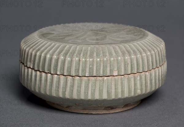 Covered Box with Carved Floral Design: Yaozhou Ware, 1100s. China, Shanxi province, Northern Song dynasty (960-1127). Glazed stoneware; diameter: 10.7 cm (4 3/16 in.); overall: 5.2 cm (2 1/16 in.).