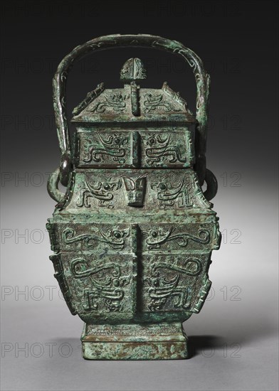 Square Wine Container (Fangyou), c. 1250-1046 BC. China, Henan province, probably Anyang, late Shang dynasty (c.1600-c.1046 BC), Anyang phase (c.1250-1046 BC). Bronze; overall: 26.7 x 13.4 cm (10 1/2 x 5 1/4 in.).