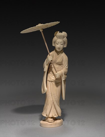 Woman Carrying a Parasol, Late 1800s- Early 1900s. Japan, Late 19th- Early 20th century. Ivory; overall: 14.9 cm (5 7/8 in.).