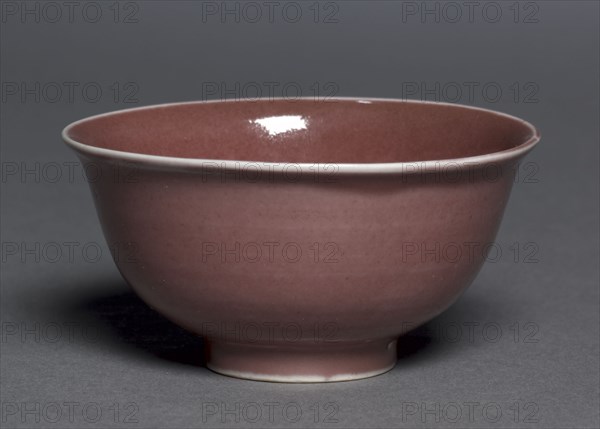 Bowl with Dragons and Clouds, 1368-1398. China, Jiangxi province, Jingdezhen, Ming dynasty (1368-1644), Hongwu period (1368-98). Porcelain with molded and incised decoration and copper-red glaze; diameter: 10 cm (3 15/16 in.); overall: 5 cm (1 15/16 in.).