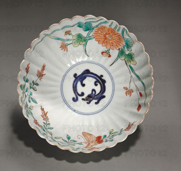 Fluted Bowl with Dragon, Butterfly, and Flowers, early 1700s. Japan, Edo Period (1615-1868). Porcelain with underglaze blue and overglaze color enamels and gold (Hizen ware, Kakiemon type); diameter: 18.6 cm (7 5/16 in.); height: 8.6 cm (3 3/8 in.).