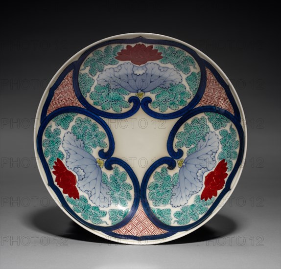 Dish with Lotus in Rui-Head-Shaped Cartouches, mid-1800s. Japan, Edo period (1615-1868). Porcelain with underglaze blue and overglaze enamel (Hizen ware, Nabeshima type); diameter: 20.4 cm (8 1/16 in.); overall: 5.6 cm (2 3/16 in.).