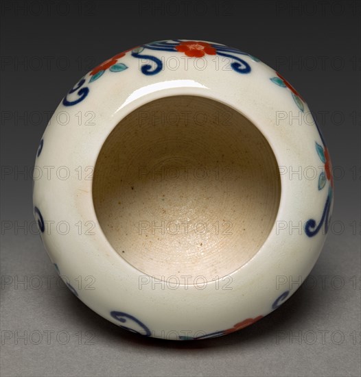 Incense Burner with Floral Scroll, 1800s. Japan, Edo Period (1615-1868). Porcelain with underglaze blue and overglaze enamel decoration (Hizen ware, Nabeshima style); diameter: 7.4 cm (2 15/16 in.); with cover: 6.8 cm (2 11/16 in.); without cover: 5.9 cm (2 5/16 in.).