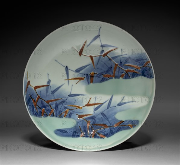 Dish with Reeds and Mist, c. 1700. Japan, Edo Period (1615-1868). Porcelain with underglaze blue and overglaze color enamels (Nabeshima ware); diameter: 20.1 cm (7 15/16 in.); overall: 5.6 cm (2 3/16 in.).
