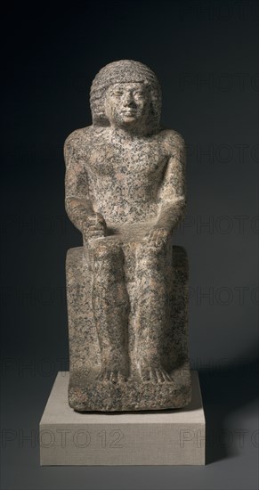 Seated Statue of Nykara, 2408-2377 BC. Egypt, Old Kingdom, Dynasty 5, reign of Niuserra or later, 2408-2377 BC. Red granite and pigment; overall: 53.4 x 20.5 x 28 cm (21 x 8 1/16 x 11 in.).