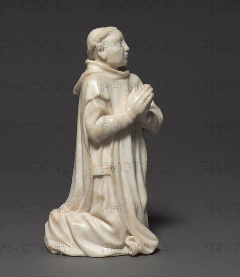 Kneeling Carthusian Monk, c. 1380-1400. France, Burgundy, Dijon, 14th century. Marble; overall: 25.7 x 14.1 x 6.8 cm (10 1/8 x 5 9/16 x 2 11/16 in.).