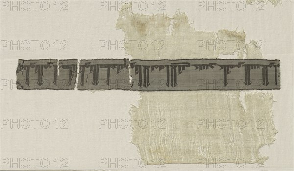 Fragment of Inscription Band, 945-1055. Iran or Iraq, Buyid period, 10th-11th Century. Compound tabby on tabby ground; silk; overall: 74.2 x 37.1 cm (29 3/16 x 14 5/8 in.)