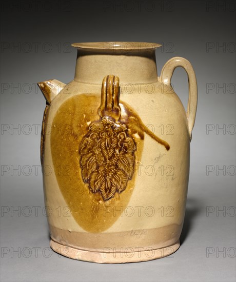 Ewer, 800s. China, Hunan province, Tongguan, early Tang dynasty (618-907). Glazed stoneware with molded and applied decoration, Changsha ware; overall: 22.5 cm (8 7/8 in.).