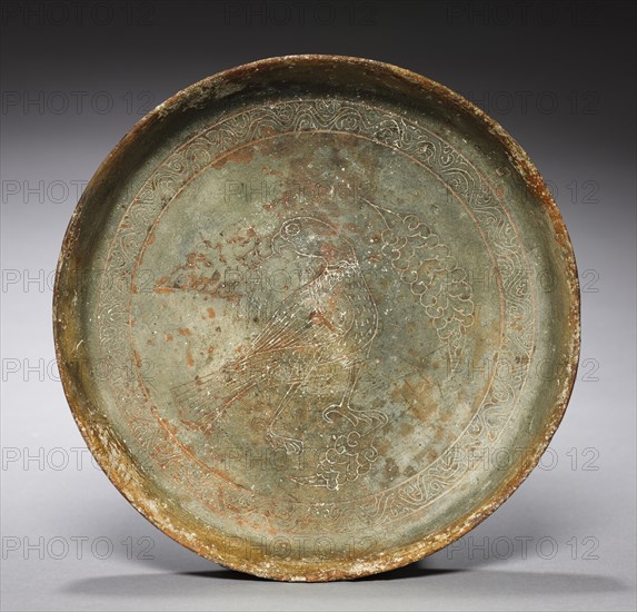 Deep Plate with Hawk and Foliage, 1100s. Byzantium, 12th century. Sgraffito earthenware; diameter: 3.9 x 22.3 cm (1 9/16 x 8 3/4 in.).