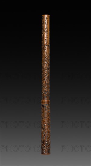 Brush with Carved Design, 1573-1619. China, Ming dynasty (1368-1644), Wanli mark and reign (1573-1619). Carved bamboo; overall: 24.2 cm (9 1/2 in.); handle: 21 cm (8 1/4 in.); top: 16.8 cm (6 5/8 in.).