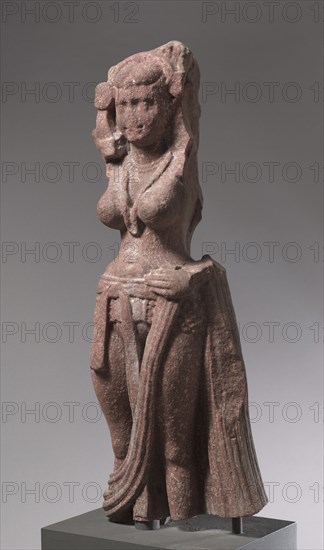 Nature Divinity (Yakshi), c. 75. India, Mathura, Kshatrapa period (c. 20 BC-AD 114). Mottled red sandstone; overall: 127.6 x 49 x 25.4 cm (50 1/4 x 19 5/16 x 10 in.).